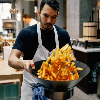a man cooking a man cooking